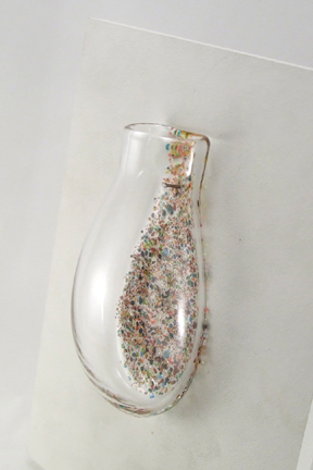Wall Vase. Hangs on a nail.  When filled with water, texture on back magnifies. Fill with fresh or dried flowers, root house plants or use as a scented oil diffuser. Approx 5-7" h x 3" w