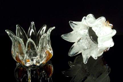 Tea light candle holders. Solid sculpted glass. Available in clear glass or many color options. Approx. 4" x 4" x 3"