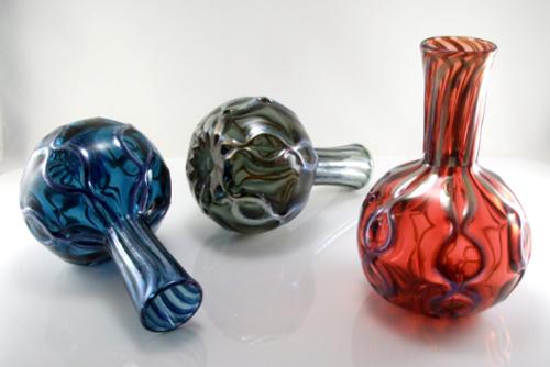 Blown glass flower vase. Available in many color options. Approx. 7-9" h x 5" w 