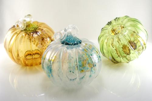 Blown pumpkins with openings underneath, designed to be filled with LED string lights (see next photo). Approx. 6" x 6"
