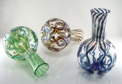 Blown glass flower vase. Available in Green, Gold or Blue Luster options. Approx. 7-9" h x 5" w 