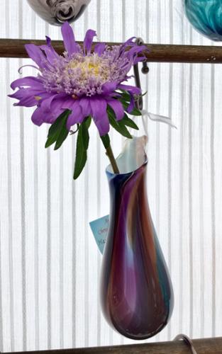 Blown Glass vase, made for suspending from hooks or nails with ribbon. Each piece is completely unique and different. Designs are freeform and can not be recreated identically. Fill with fresh fresh or dried flowers, root house plants or use as a scented oil diffuser. Approx. 5-7" tall